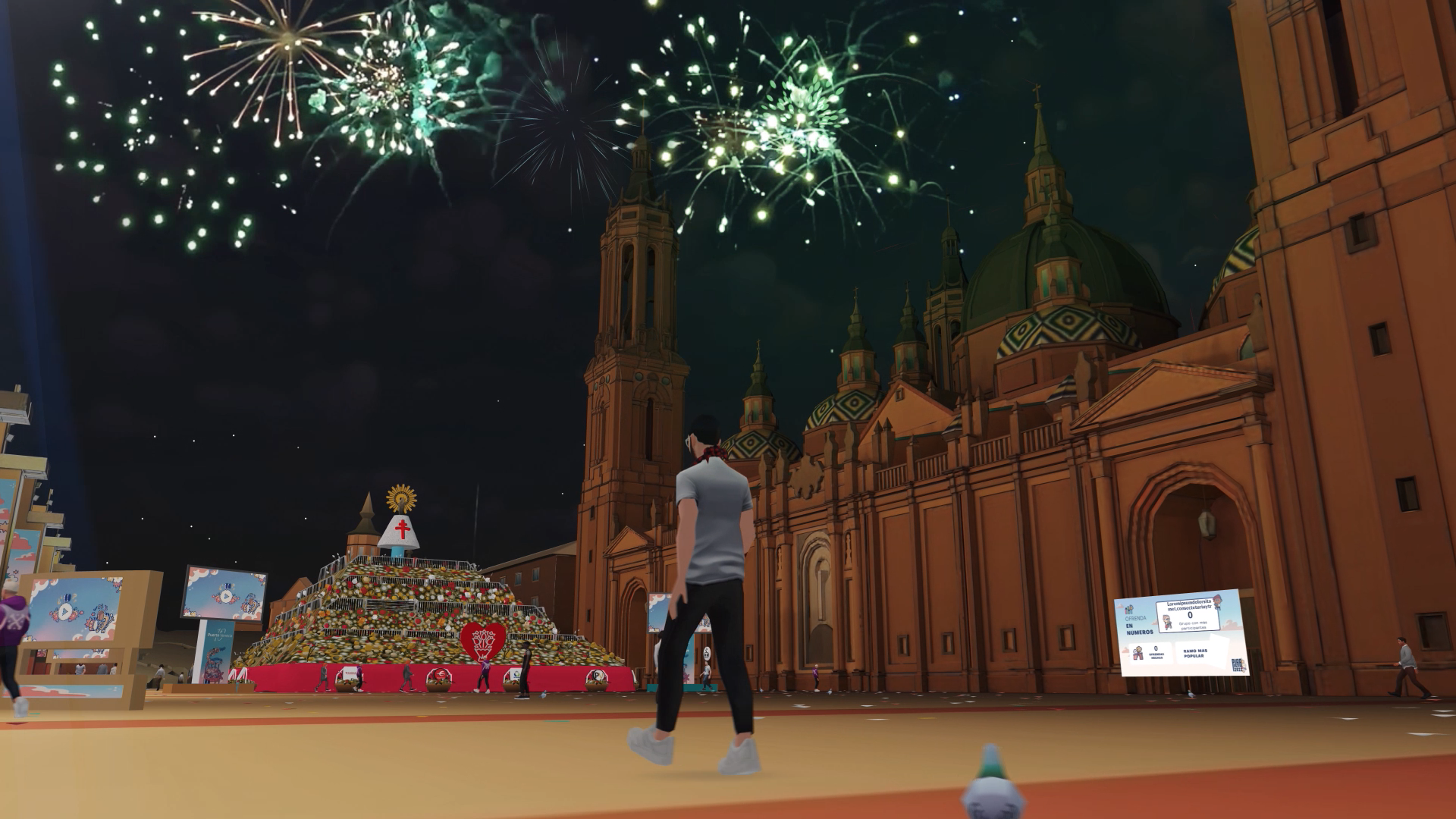 Disfrutando de los fuegos artificiales de fin de fiestas frente al manto en la plaza virtual. Fuente: IMASCONO.